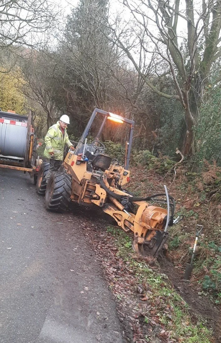 Dowson team member working on a rural utility route